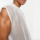 Mesh See-Through Sleeveless Loose T-Shirt showcasing sheer mesh fabric and stylish fit.