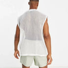 Mesh See-Through Sleeveless Loose T-Shirt showcasing a sheer mesh back, perfect for summer streetwear.