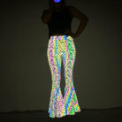 Slim Fit Reflective Bodycon Pants showcase vibrant colors and stunning reflections, perfect for festivals.