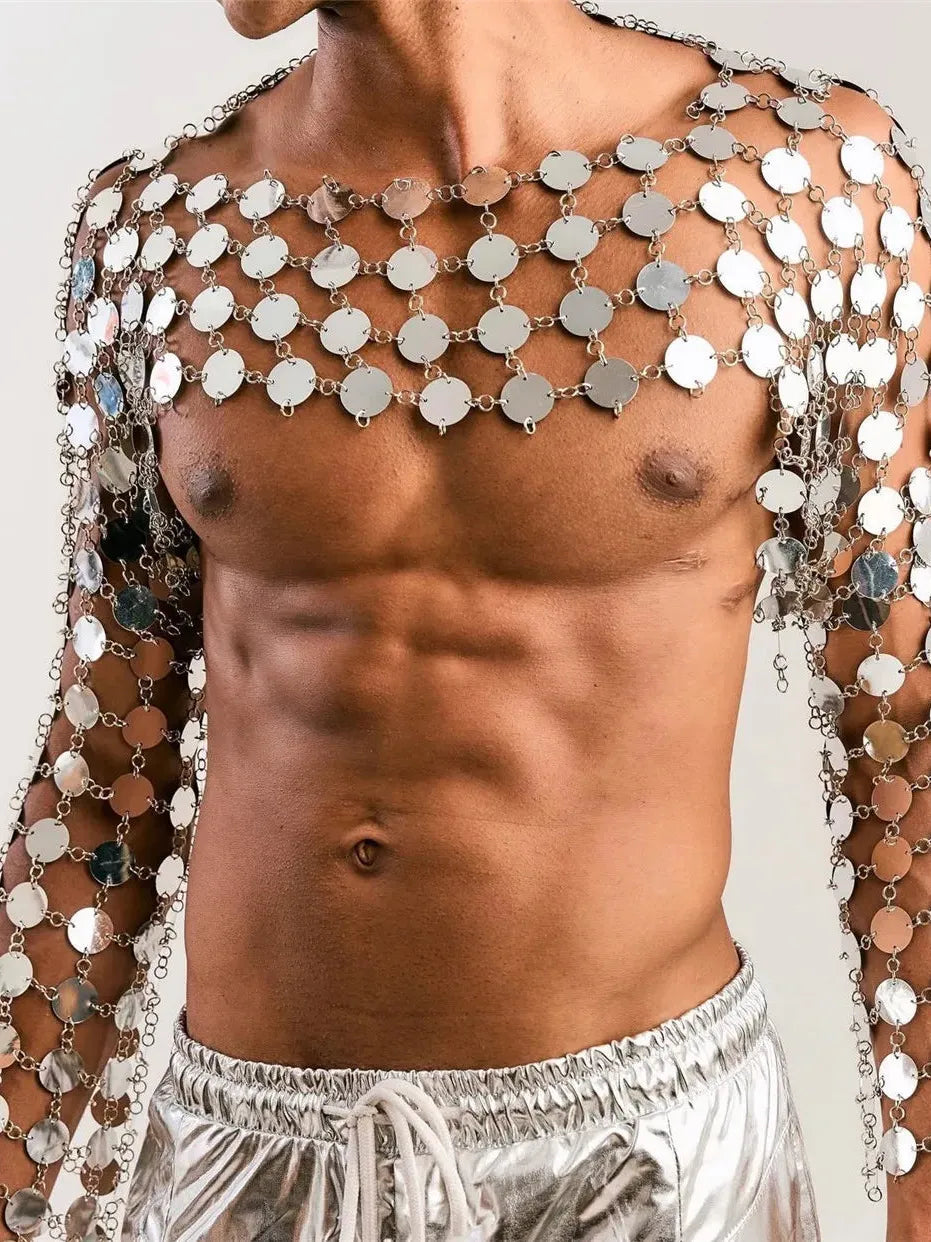 close-up of metal chain disc crop top with shiny circular discs reflecting light