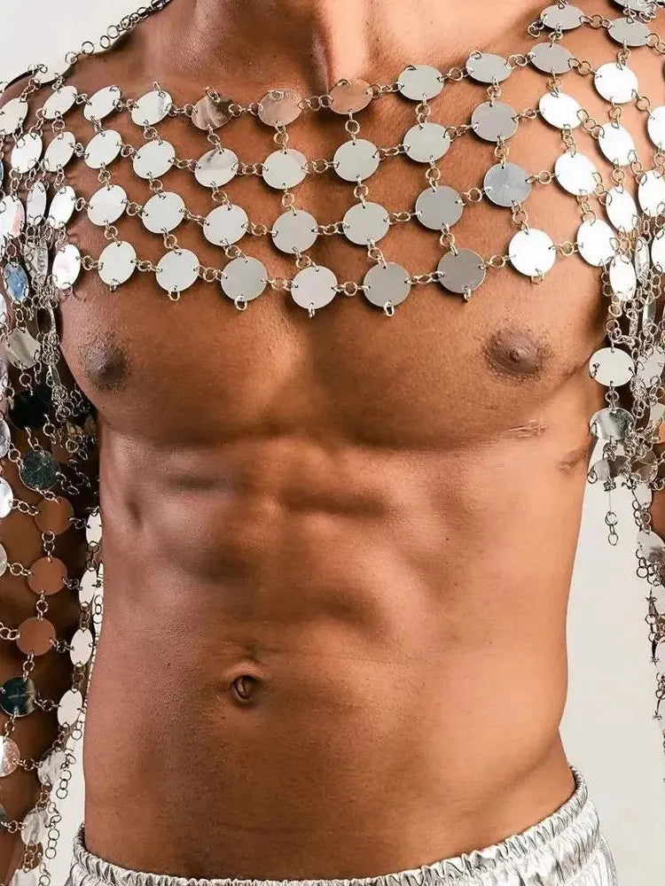 metal chain disc crop top close-up of metallic discs on torso with chain design