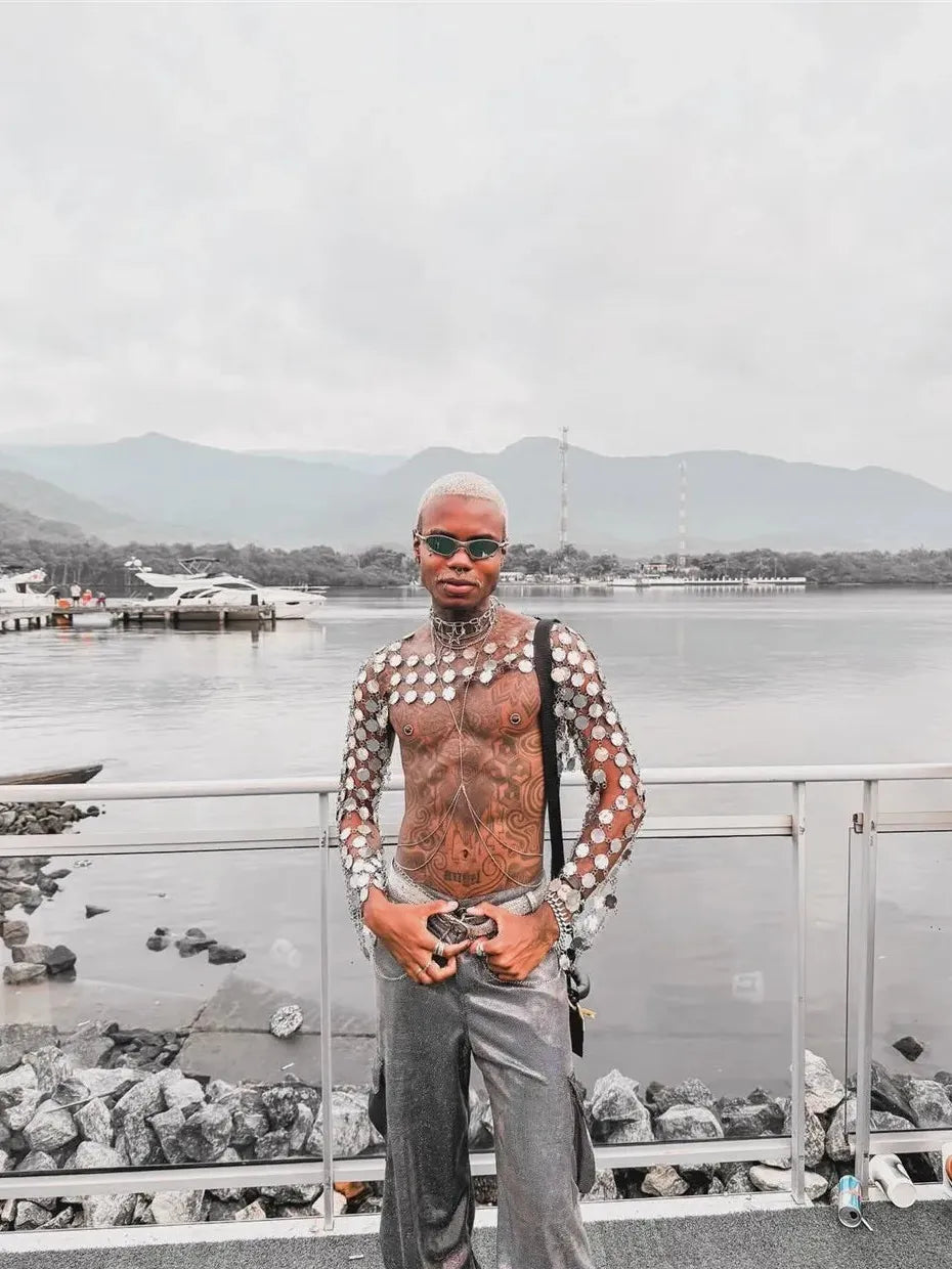 metal chain disc crop top close-up of model showcasing stunning armor-inspired design at waterfront