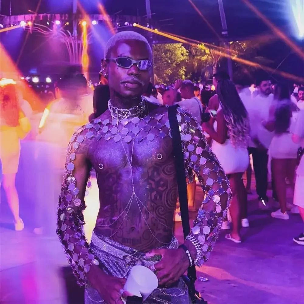 metal chain disc crop top worn at a vibrant party, showcasing metallic circular discs and edgy style