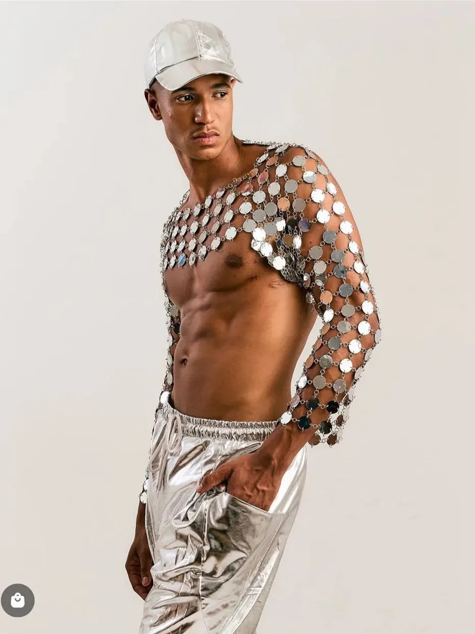 metal chain disc crop top close-up metallic reflective circular discs on stylish model