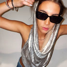Model wearing a Metallic Mesh Hooded Shirt, showcasing its shimmering fabric and stylish design.