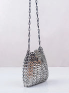 Bolso elegante de lentejuelas metálicas con diseño brillante, perfecto para festivales y fiestas.