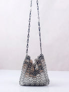 Bolso de lentejuelas metálicas con brillo y diseño elegante, perfecto para festivales y fiestas.