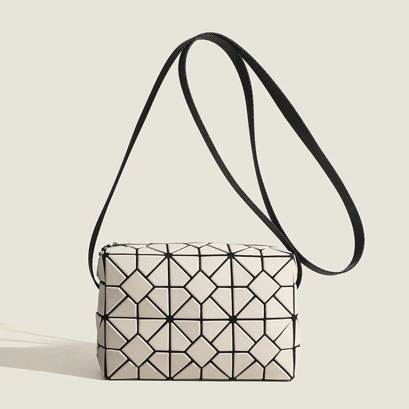 Stardust Geometric Handbag featuring a unique pattern, perfect for adding style to festival outfits.