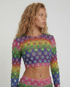 Multicolor rhinestone mesh crop top with rainbow gradient and honeycomb print.