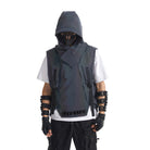 Multicolor reflective techno vest with hood, worn over a white t-shirt, featuring tactical straps and futuristic design.