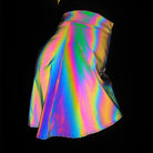 Multicolor reflective polyester two-piece set, flaring into rainbow brilliance under light.