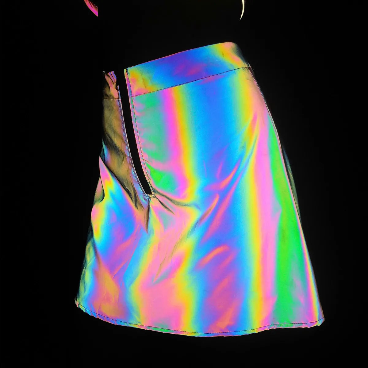 Multicolor reflective polyester mini skirt with a black zipper, showcasing its rainbow brilliance.
