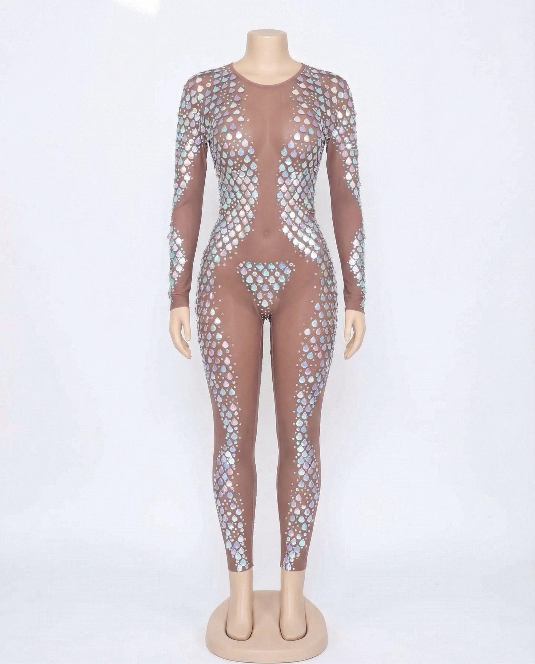 Sheer brown mesh jumpsuit with iridescent shell embellishments covering the body and legs.
