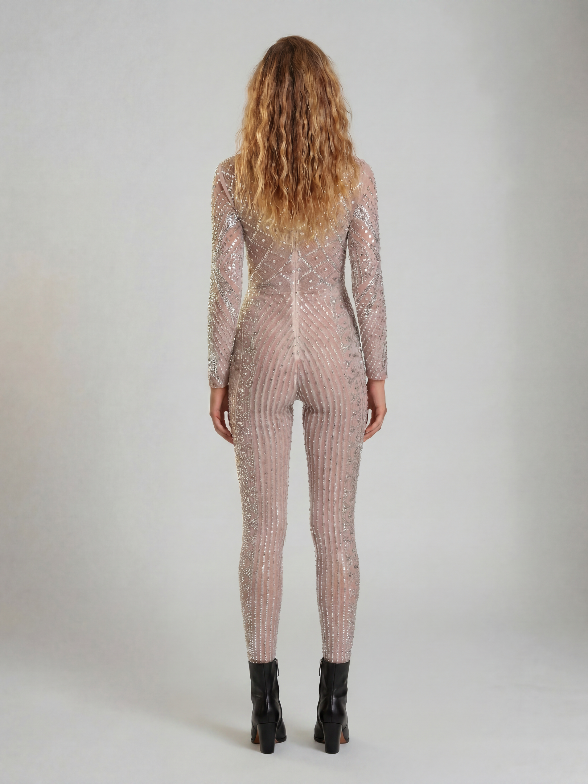 Nova Silver Rhinestone Jumpsuit, a fitted, long-sleeve, full-coverage garment with hand-glued rhinestones.