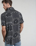 Back of model wearing a Black Boho Print Shirt