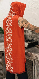 Hooded Sleeveless Cardigan in orange with geometric print, perfect for festivals and layering.