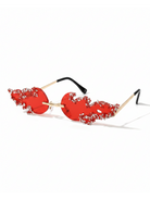 Luna Flame Crystal Rimless Sunglasses with red lenses, gold frames, and flame-shaped crystal embellishments.