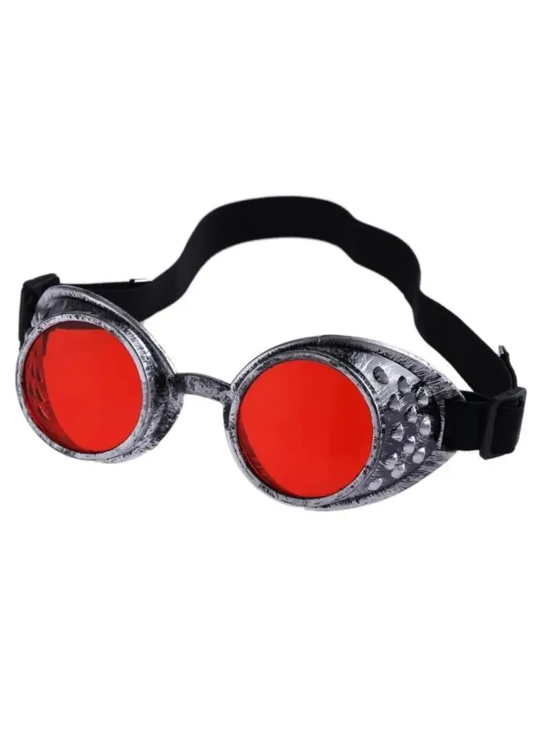 Vintage steampunk goggles with distressed silver frames, bright red lenses, and a black elastic strap.