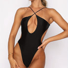 Body noir à découpes avec des découpes uniques et un design élégant pour les festivals et les raves.