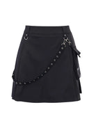 Mini falda negra para rave con bolsillo lateral desmontable y detalles elegantes para noches de techno.