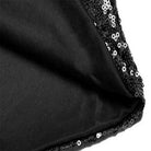 Close-up of a black sequin short sleeve men's shirt, showing the shimmering sequins and smooth inner lining.