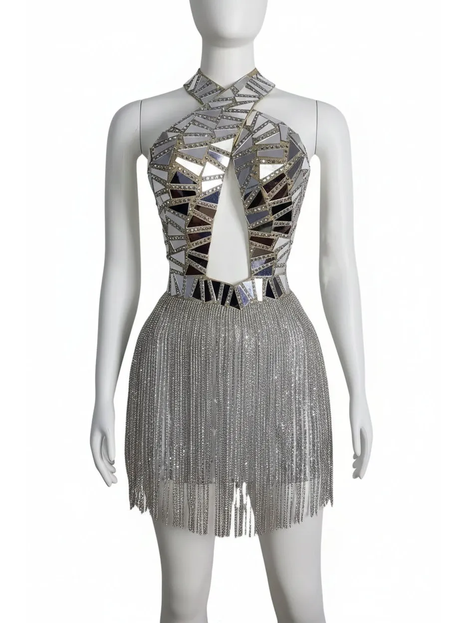 Silver mirror sequin fringe dress with a halter neckline and front cutout on a mannequin.