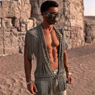 Silver crochet fringe men's cardigan with intricate knotwork and dramatic flowing fringe, worn open-front.