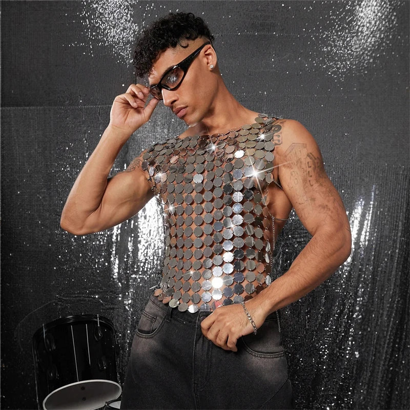 Men's silver mirror disc chain vest, one size, with open chain sides, worn by a man.