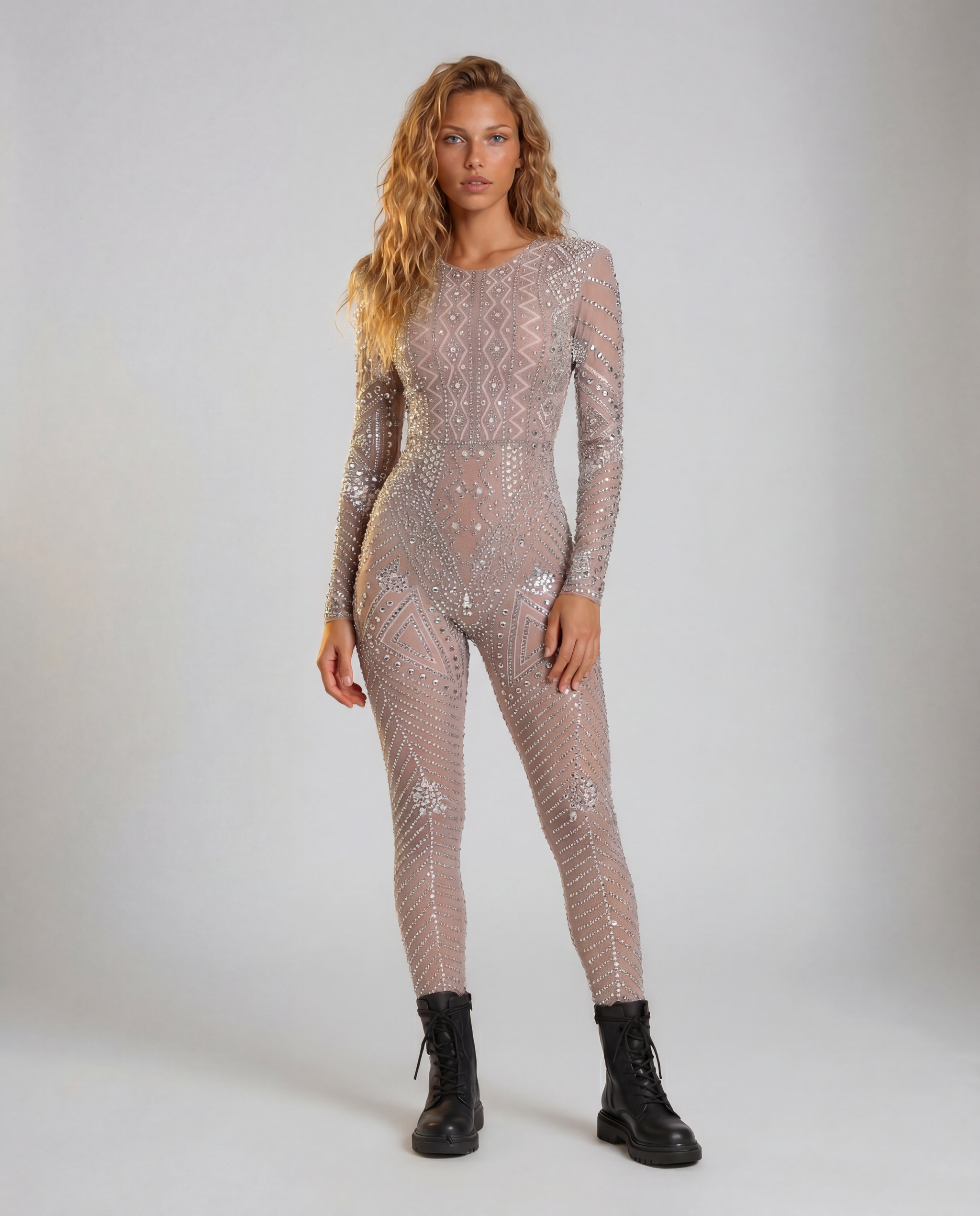 Nova Silver Rhinestone Jumpsuit: full-body, long-sleeve, fitted, sheer nude polyester-elastane with geometric rhinestone patterns.