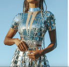 Close-up of Sequin Rhinestone Festival Mini Dress, featuring shiny sequins and rhinestone details.