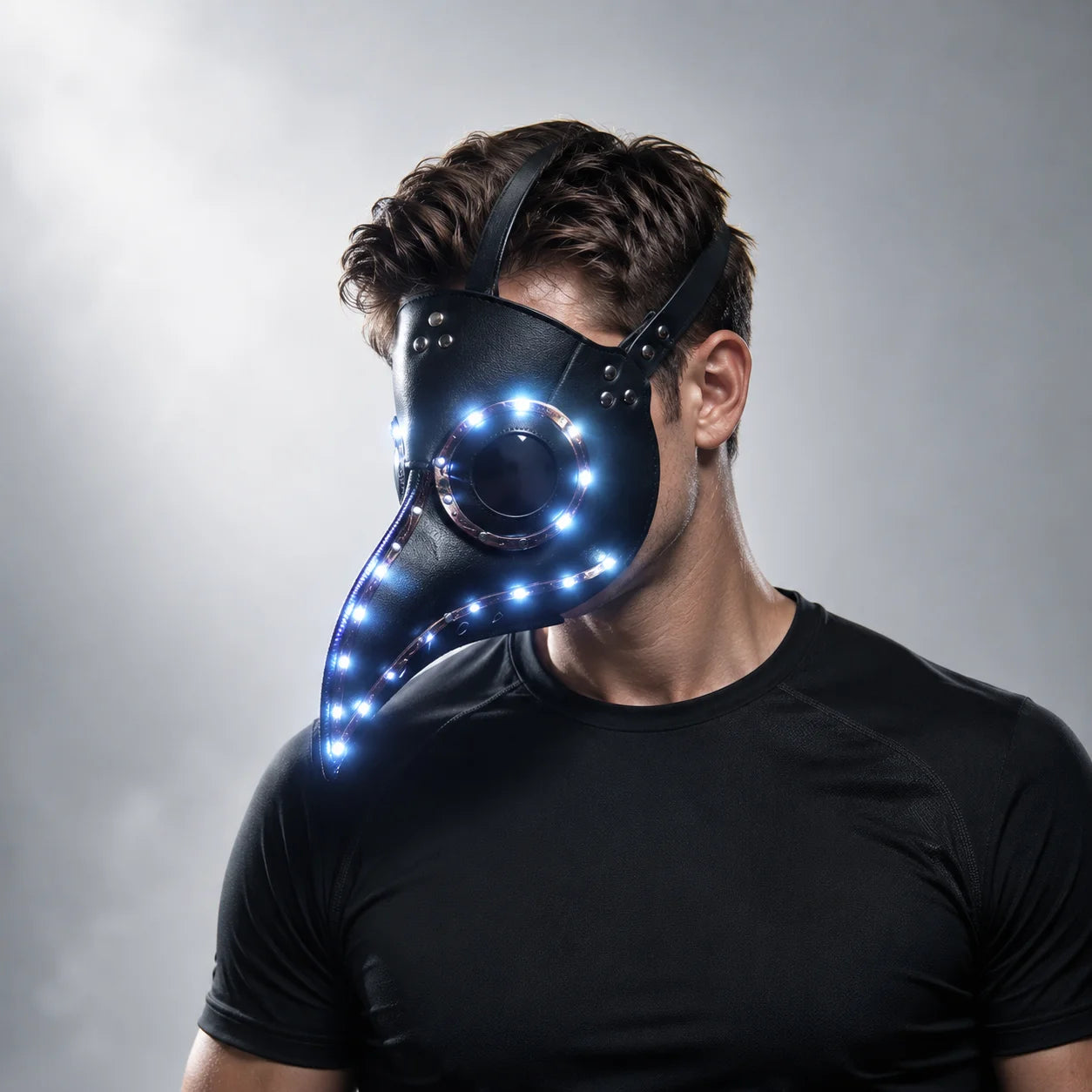Black faux-leather steampunk plague doctor mask featuring glowing LED lights and an adjustable strap for a comfortable fit.