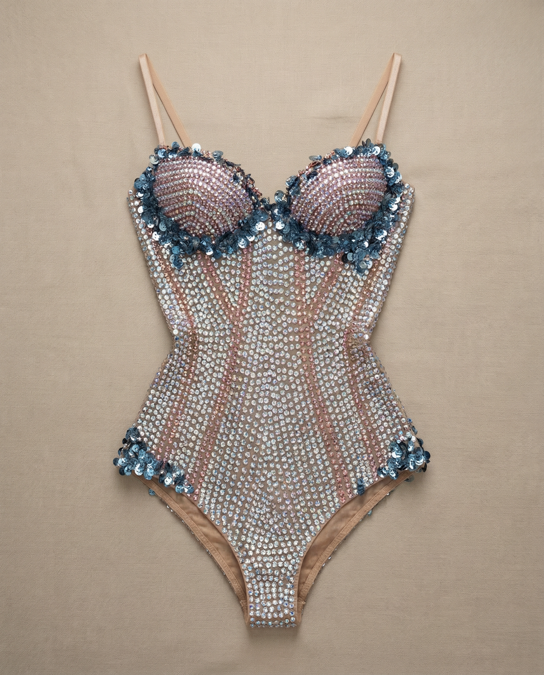 Stella Beige Rhinestone Corset Bodysuit with silver and warm crystal rhinestones, floral trim, and slim straps.