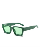 Malmö chunky square sunglasses featuring a dark green polycarbonate frame and matching light green resin lenses.