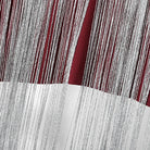 tassel fringe crop top close-up of red and silver cascading fringe details