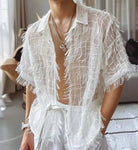 Transparentes Tassel-T-Shirt mit transparentem Stoff und verspielten Quasten, perfekt für Festivals und Sommerveranstaltungen.