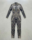 Black sequin jumpsuit with silver rhinestone accents, long sleeves, and a high neckline.