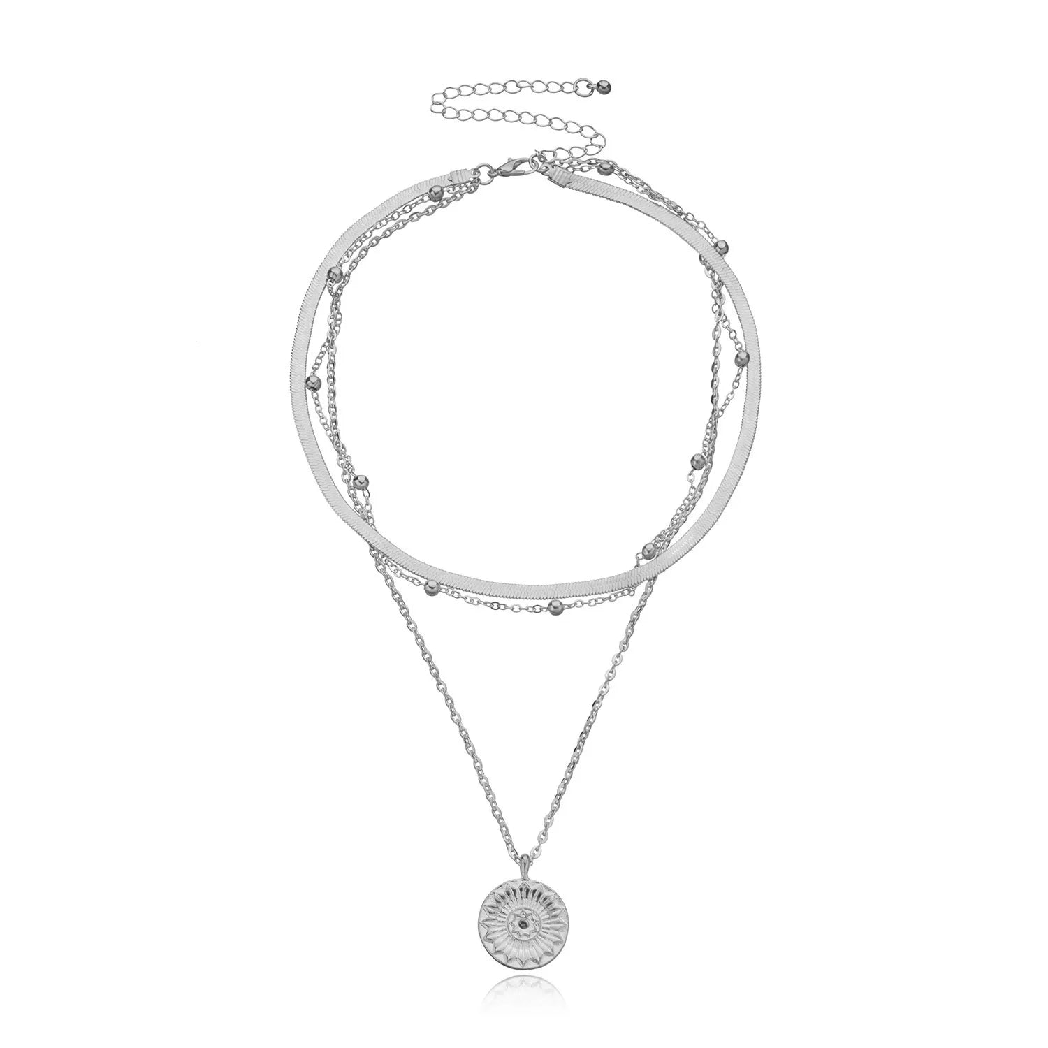 Chain Necklace in silver with layered chains and a decorative pendant for festival fashion.