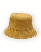 Sombrero tipo bucket lavado en un color beige cálido, hecho de algodón para festivales y uso casual.